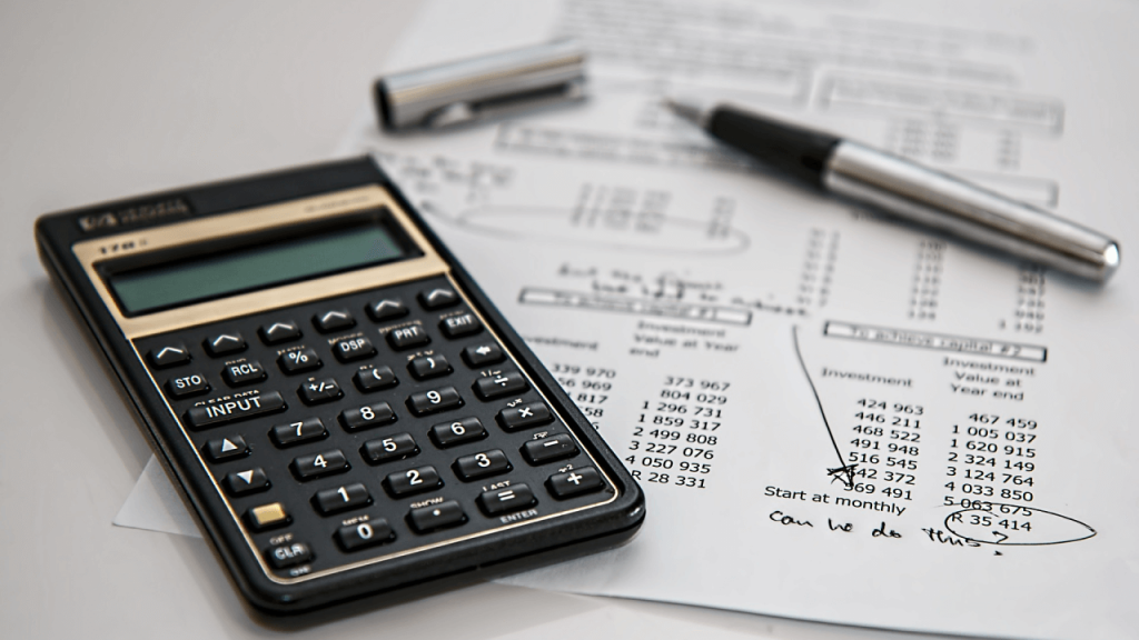 Calculator and paper on table